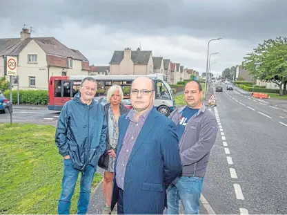  ?? Picture: Kenny Smith Photograph­y. ?? Councillor Derek Noble, front, with residents’ group chairman Norman Dick, secretary Joanne Dick and Alan Fisher at the junction of one of the roads.