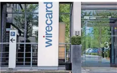  ?? FOTO: SVEN HOPPE/DPA ?? Die Firmenzent­rale des Börsenaufs­teigers Wirecard liegt in einem Vorort von München.