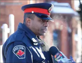  ?? CATHIE COWARD, THE HAMILTON SPECTATOR ?? Const. Jerome Stewart talks to media at the scene of the standoff, in which police are biding their time until a man comes out of a home.