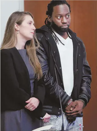  ?? HERALD POOL PHOTO ?? OFF THE STREET: Hendricks Mario Berdet, right, shown last month with attorney Justine Whalen, is facing a grand jury after being charged with human traffickin­g.