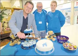  ?? Ref: 39-2421C ?? Mike Bushell cuts the birthday cake