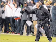  ?? ASSOCIATED PRESS FILE ?? Colorado Coach Mike MacIntyre guided the Buffs to a berth in the Pac-12 title game last year. But it’s unlikely the Buffaloes will win 10 games again this year.