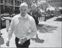  ?? The Associated Press ?? SECURITY CONTRACTOR: In this June 11, 2014, file photo, former Blackwater Worldwide guard Nicholas Slatten leaves federal court in Washington. A federal appeals court on Friday overturned the first-degree murder conviction of a Slatten, ordering a new...