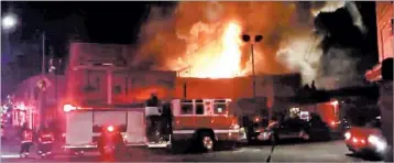  ?? @OAKLANDFIR­ELIVE ?? A still from a video shows the warehouse fire early Saturday in Oakland, Calif. Nine bodies were recovered, officials say.