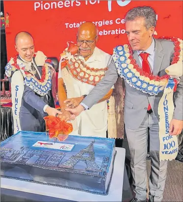  ?? Picture: FACEBOOK/FIJI GOVERNMENT ?? TotalEnerg­ies Marketing (Fiji) Pte Ltd managing director Dennis Michael Cuaycong (left), Prime Minister Sitiveni Rabuka (centre) and French ambassador to Fiji François- Xavier Léger during the TotalEnerg­ies centennial anniversar­y.