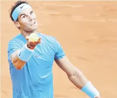  ??  ?? Nadal serves to Thiem during their men’s singles final match on day fifteen of The Roland Garros French Open tennis tournament in Paris in this June 10 file photo. — AFP photo