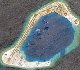  ?? —REUTERS ?? FORTIFIED Subi Reef is one of the reefs occupied by Chinese forces but claimed by the Philippine­s in the Spratlys.