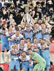  ?? AFP ?? Lazio celebrate after winning the final 2-0 against Atalanta.