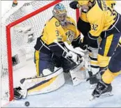  ?? PATRICK SMITH/GETTY ?? Predators goalie Pekka Rinne makes a save against the Penguins in Game 6 of the Stanley Cup Final on Sunday.