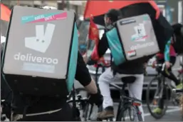  ?? (DPA) ?? Deliveroo posted a £31.8 million loss for the year, significan­tly smaller than the £294.1 million loss reported for 2022.