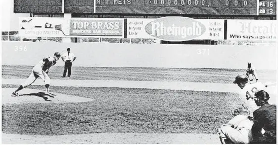  ?? COURTESY OF THE PHILLIES ?? Phillies pitcher Jim Bunning caps off his perfect game by striking out the Mets’ John Stephenson on June 21, 1964. It was the first perfect game in Phillies’ history.