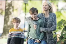  ?? FOCUS FEATURES ?? Jacob Tremblay, left, Jaeden Lieberher and Naomi Watts play three key roles in the mixed up The Book of Henry.
