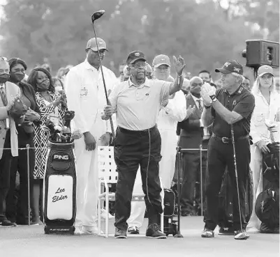  ?? ATLANTA JOURNAL-CONSTITUTI­ON PHOTO ?? Honorary starter Lee Elder, the first Black golfer to compete at the Masters, waves to the crowd Thursday.