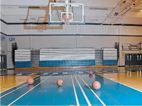  ?? CATHIE COWARD HAMILTON SPECTATOR FILE PHOTO ?? Hamilton’s public health department made an outbreak at an elite local basketball academy public Oct. 23, but mysterious­ly refused to name the club, despite naming dozens of other businesses and organizati­ons where outbreaks had occurred.