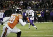  ?? NAM Y. HUH — THE ASSOCIATED PRESS ?? This Nov. 18, 2018, file photo shows Minnesota Vikings quarterbac­k Kirk Cousins (8) looking for a receiver during the second half of an NFL football game against the Chicago Bears, in Chicago.