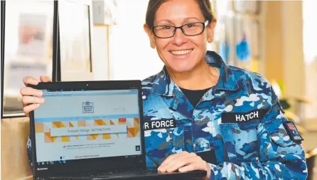  ?? PROCESS WORKS: Wing Commander Jodie Hatch, the head of administra­tion and personnel at Australia's main operating base in the Middle East Region, with informatio­n from the Australian Bureau of Statistics. Picture: ZAK SIMMONDS ??