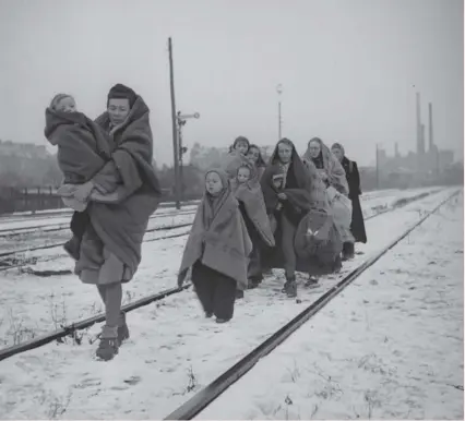  ??  ?? 0 A handful of survivors from the 150 refugees who left Lodz in Poland two months earlier arrive in Berlin in 1945