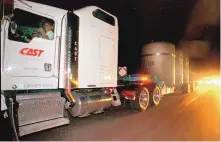  ?? EDDIE MOORE/JOURNAL ?? A truck carrying one of the first loads of nuclear waste transporte­d from Los Alamos National Laboratory to WIPP in 1999 moves along U.S. 285 just north of the Santa Fe bypass.