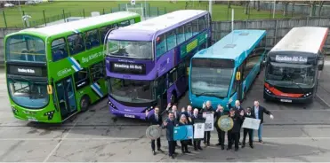  ?? Picture: Reading Borough Council ?? ON ALL THE BUSES: Representa­tives from Reading Council, Reading Buses, Thames Valley Buses, Arriva and Thames Travel celebrate the launch of the new £3.50 bus fare from Monday