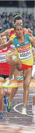  ??  ?? Scotland’s Lennie Waite in the thick of the action during the first heat of the 3,000m steeplecha­se. Picture: