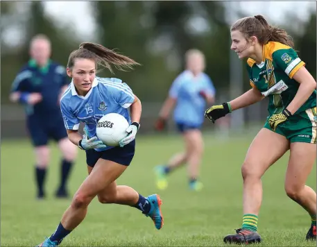  ?? Picture: GAApics.com ?? Katie Newe of Meath closes down Dublin’s Laura Carthy.