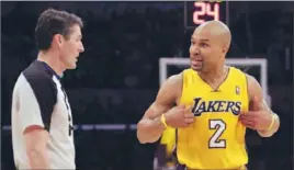  ?? Lawrence K. Ho Los Angeles Times ?? DEREK FISHER, talking with official Scott Foster, was the Lakers’ clubhouse leader and served as a buffer for Kobe Bryant and the rest of the team.