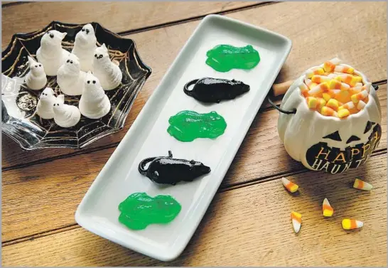  ?? Photograph­s by Kirk McKoy Los Angeles Times ?? MAKE YOUR OWN Halloween candy for the utmost in fun and freshness, and get the kids involved. Try marshmallo­w ghosts, ghoulish gummies or candy corn.