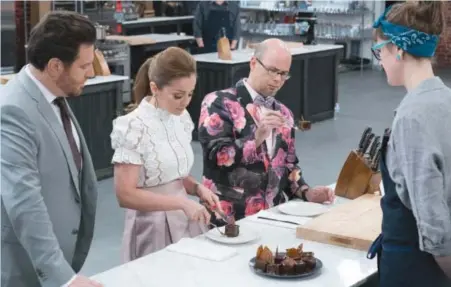  ??  ?? Scott Conant, Marcela Valladolid and Jason Smith check in on Becca Craig in”Best Baker in America”