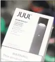  ?? SETH WENIG/AP 2018 ?? Juul had advertised e-cigarettes in print, TV, radio and online. E-cigs have been largely unregulate­d since 2007.