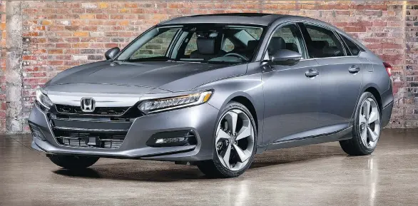  ?? HONDA ?? The 2018 Honda Accord has a new fastback styling with a slightly longer wheelbase offering more rear-seat legroom. It also has LED lighting all around.