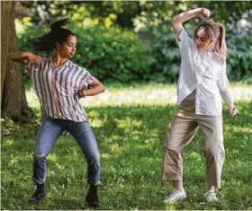  ?? Netflix ?? “I’ve always wanted to act and dance in one project,” Koshy, left, says about her role as Jasmine in “Work It.”