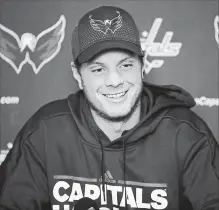  ?? ALEX BRANDON
THE ASSOCIATED PRESS ?? Washington Capitals’ John Carlson reacts during a media availabili­ty at the National Hockey League team’s practice facility Monday in Arlington, Va. The Capitals have re-signed their star defenceman.