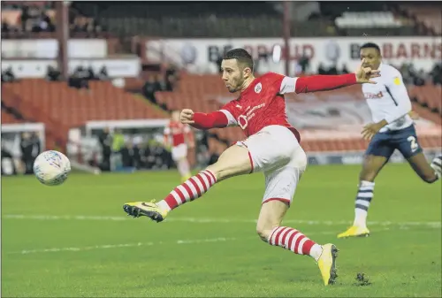  ?? PICTURE: BRUCE ROLLINSON ?? LIFELINE NEEDED: Conor Chaplin fires in a volley against Preston before the coronaviru­s struck, plunging the future of Barnsley and others into jeopardy.