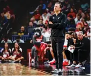  ?? ?? TOP: Coach Richard Pitino watches from the sideline as the Lobos face Clemson on Saturday. “The biggest thing about NIL is if you don’t have it, you have no chance,” Pitino said. “It’s like everything in this profession, it’s always going to be an arms race.”