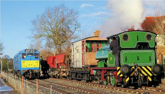  ??  ?? Class 31 No. 31289 Phoenix waits in the loop as No.15 Eustace Forth departs Boughton with a freight train during the line’s winter gala on February 9. WILL FARNDON