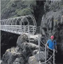  ??  ?? The Gobbins path at Islandmage­e in east Antrim features rock paths and metal walkways which are attached to the cliff face high above the sea