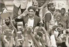  ?? REUTERS ?? Bilawal Bhutto Zardari, chairman of the Pakistan Peoples Party, waves to his supporters during a campaign rally ahead of general elections, in Karachi, July 1