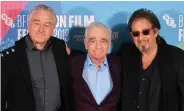  ??  ?? US filmmaker Martin Scorsese poses flanked by Robert De Niro and Al Pacino during the 2019 Film festival in London on Sunday. — AFP