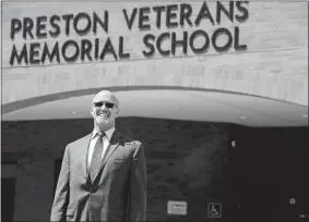  ?? SARAH GORDON/THE DAY ?? New Preston Superinten­dent Roy Seitsinger poses for a photo Wednesday at Veterans Memorial School.