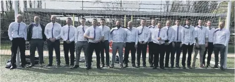  ??  ?? The well-turned out Riverside FC team before their Europa League final defeat at the hands of Benwick Athletic.