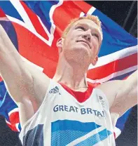  ??  ?? Greg Rutherford celebrates his London gold.