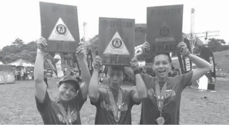  ??  ?? Winners of Spartan Race PH Female Elite Category proudly show off their trophy. From L to R : 1st Placer Ali Zandra Chiongbian, 2nd Placer Melba Vergara and 3rd Placer Chi Ying Chou.