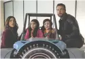  ?? Courtesy of Netflix ?? From left, Gina Rodriguez, Everly Carganilla, Connor Esterson and Zachary Levi star in
“Spy Kids: Armageddon.”