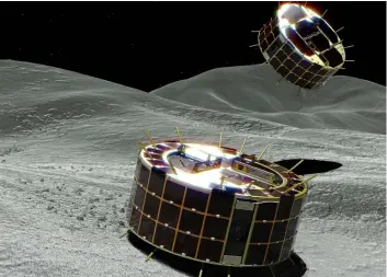  ??  ?? This computer graphic image provided by the Japan Aerospace Exploratio­n Agency (JAXA) shows two drum-shaped and solar-powered Minerva-II-1 rovers on an asteroid. JAXA VIA AP