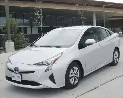  ?? LESLEY WIMBUSH / DRIVING. CA ?? Driving.ca was able to take the fuel efficiency of the new Prius as low as 3.7 litres per 100 kilometres. Less drag from the origami-like sheet metal is one reason. Upper trim levels get a lighter, higher-tech lithium battery as well.