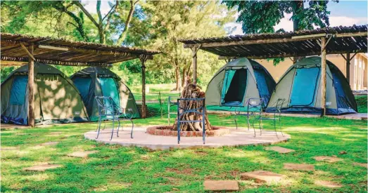  ??  ?? The camping life at Great Zimbabwe Hotel.