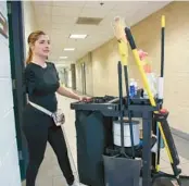  ?? LUIS SANTAN/TNS ?? Paola Andrea Gutiérrez is pictured working at the University of South Florida on Nov. 18 in Tampa.