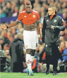  ??  ?? Manchester United’s Paul Pogba (left) walks off as he is substitute­d for Marouane Fellaini after sustaining an injury during the UEFA Champions League match against Basel at Old Trafford in Manchester, Britain in this Sept 12 file photo. — Reuters photo