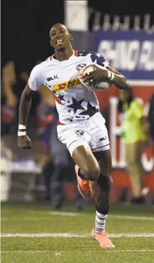  ?? David Becker / Getty Images 2016 ?? Perry Baker of the United States won the 2017 World Rugby Men’s Sevens Player of the Year award.