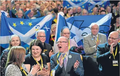  ?? Picture: Getty. ?? Delegates react to Nicola Sturgeon’s speech to the SNP conference in Aberdeen.